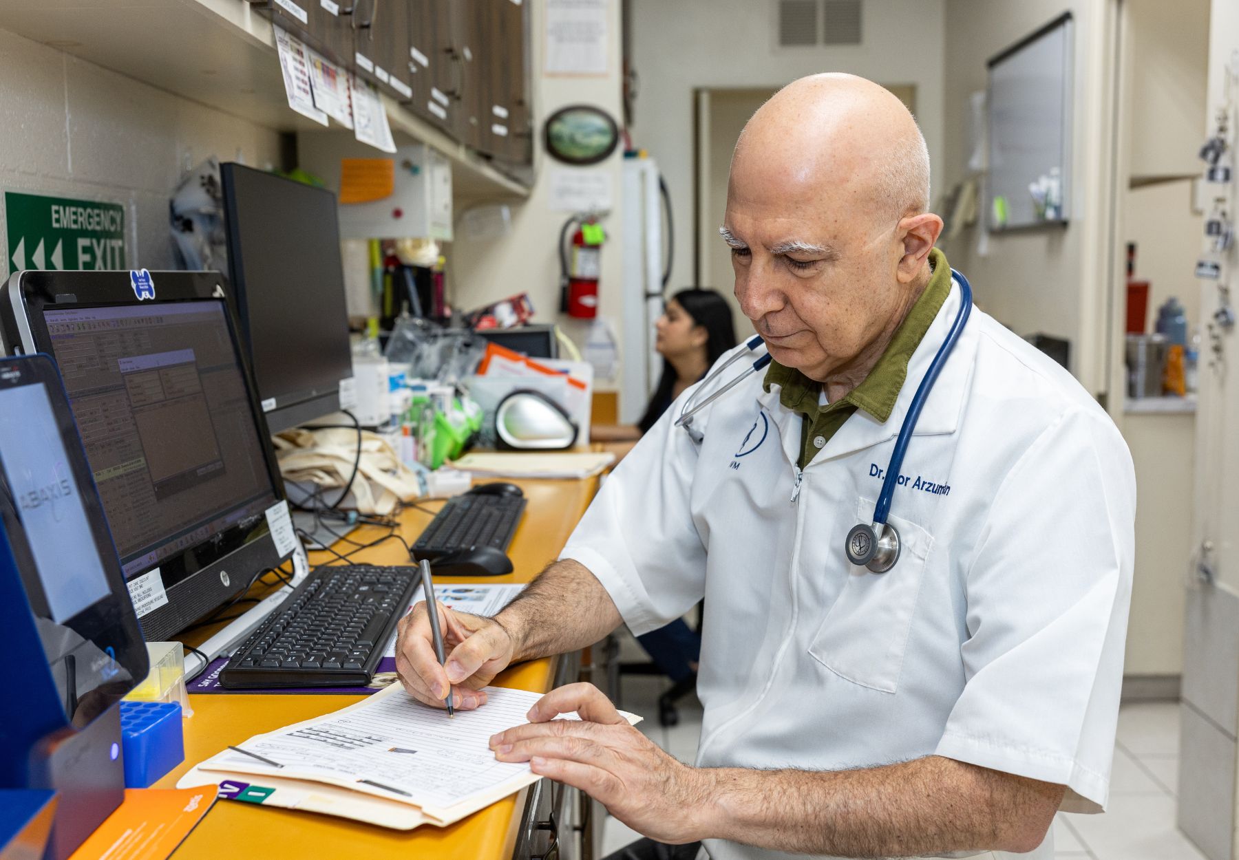 a doctor making report